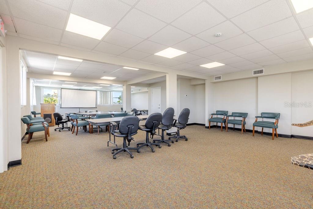 Third floor conference room with wrap around windows.