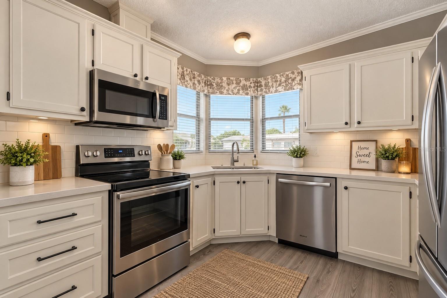 Virtual staged kitchen with upgraded appliances, etc.