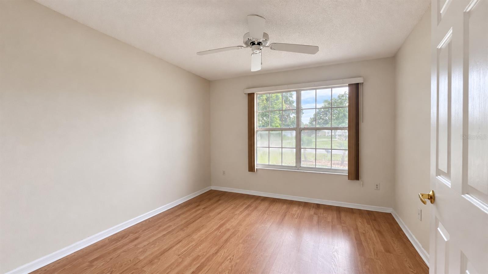 2 of 3 total bedrooms unstaged.