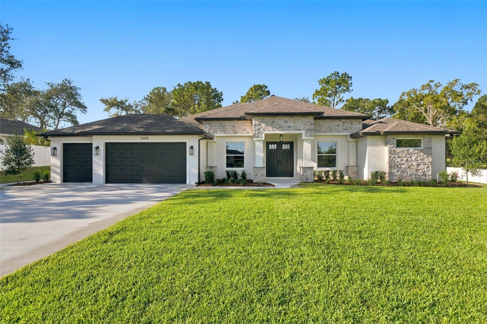 3 car garage 1/2 acre