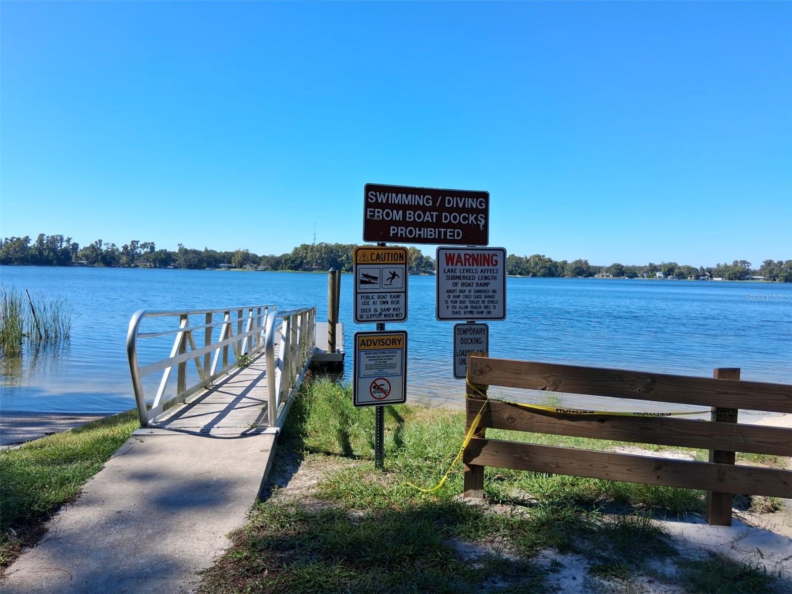 Park signs at boat ramp and pier