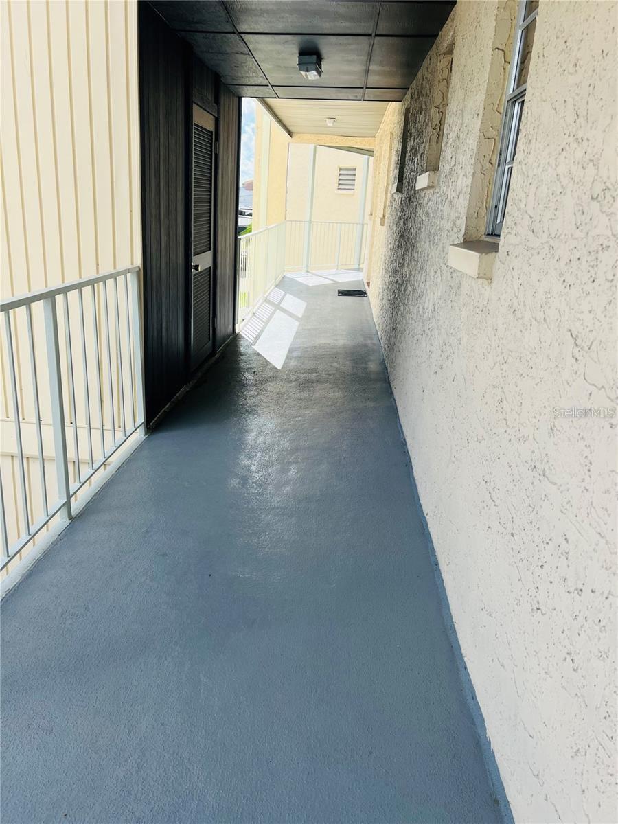 WALK WAY TO LAUNDRY AND ELEVATOR