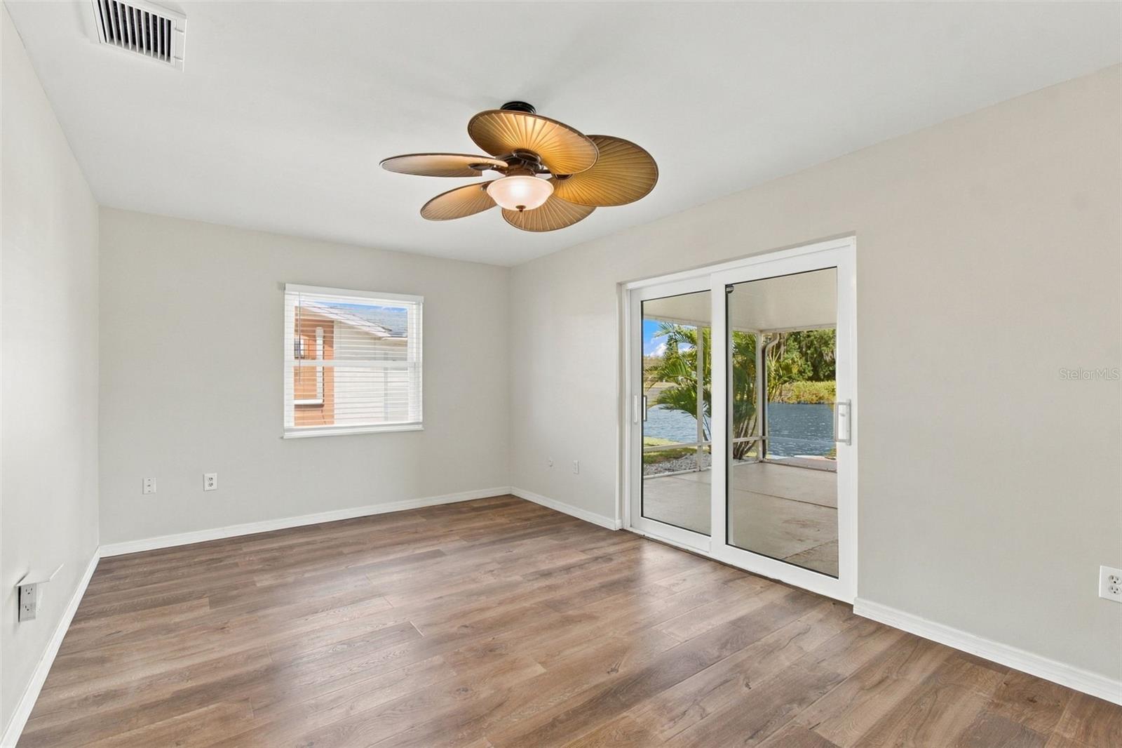 primary bedroom with lake view