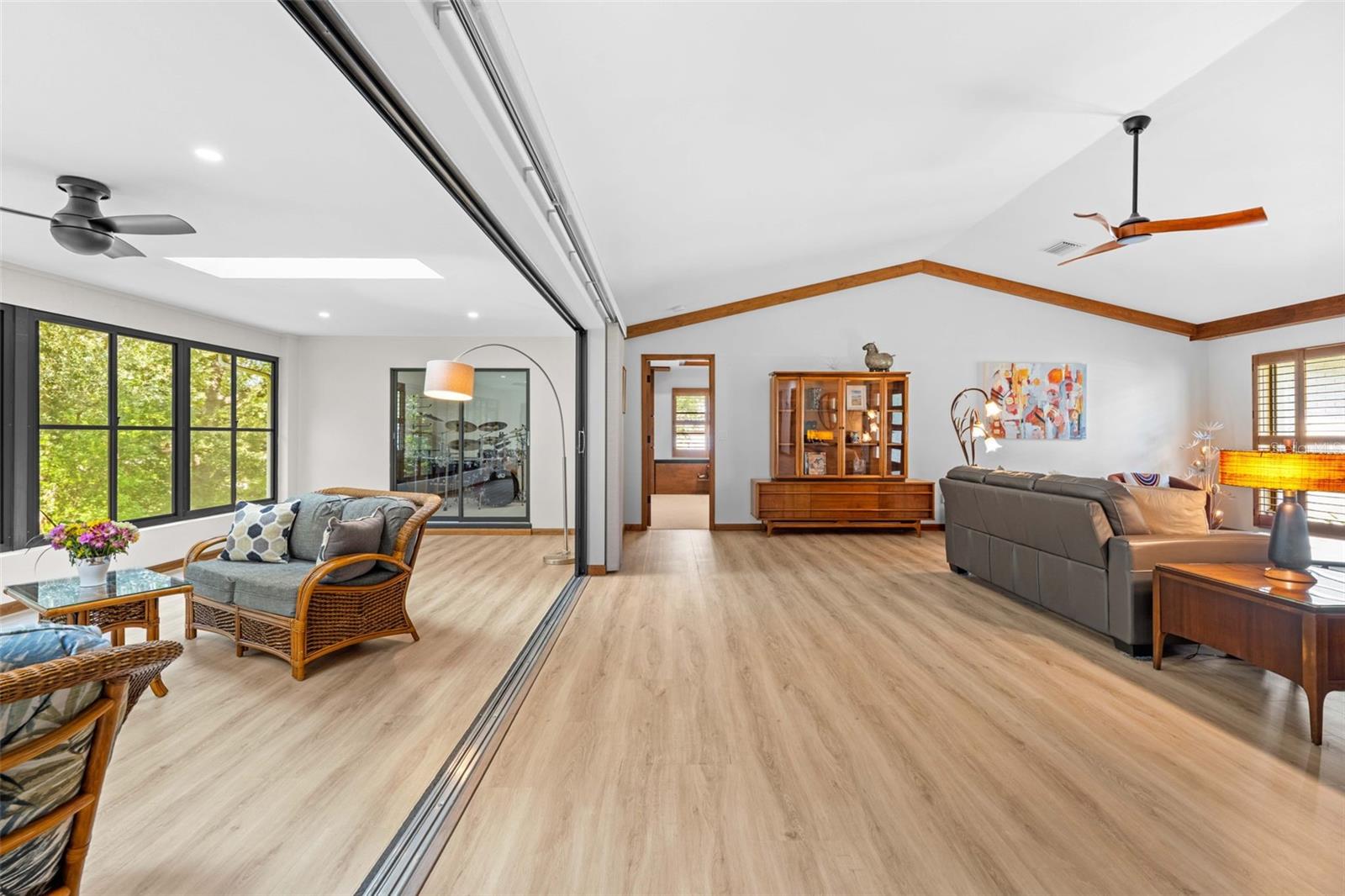 Sliders between Living Room & Fla room open all the way