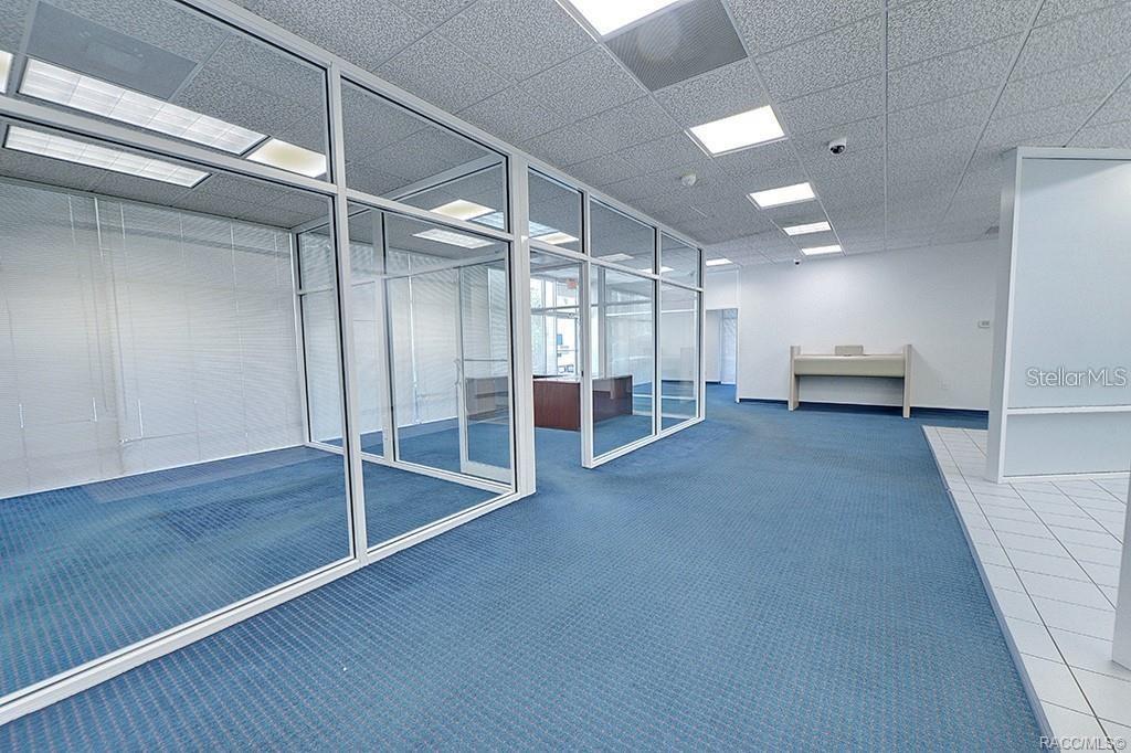 Connected office and customer areas within the former bank layout. Connected office and customer areas within the former bank layout.