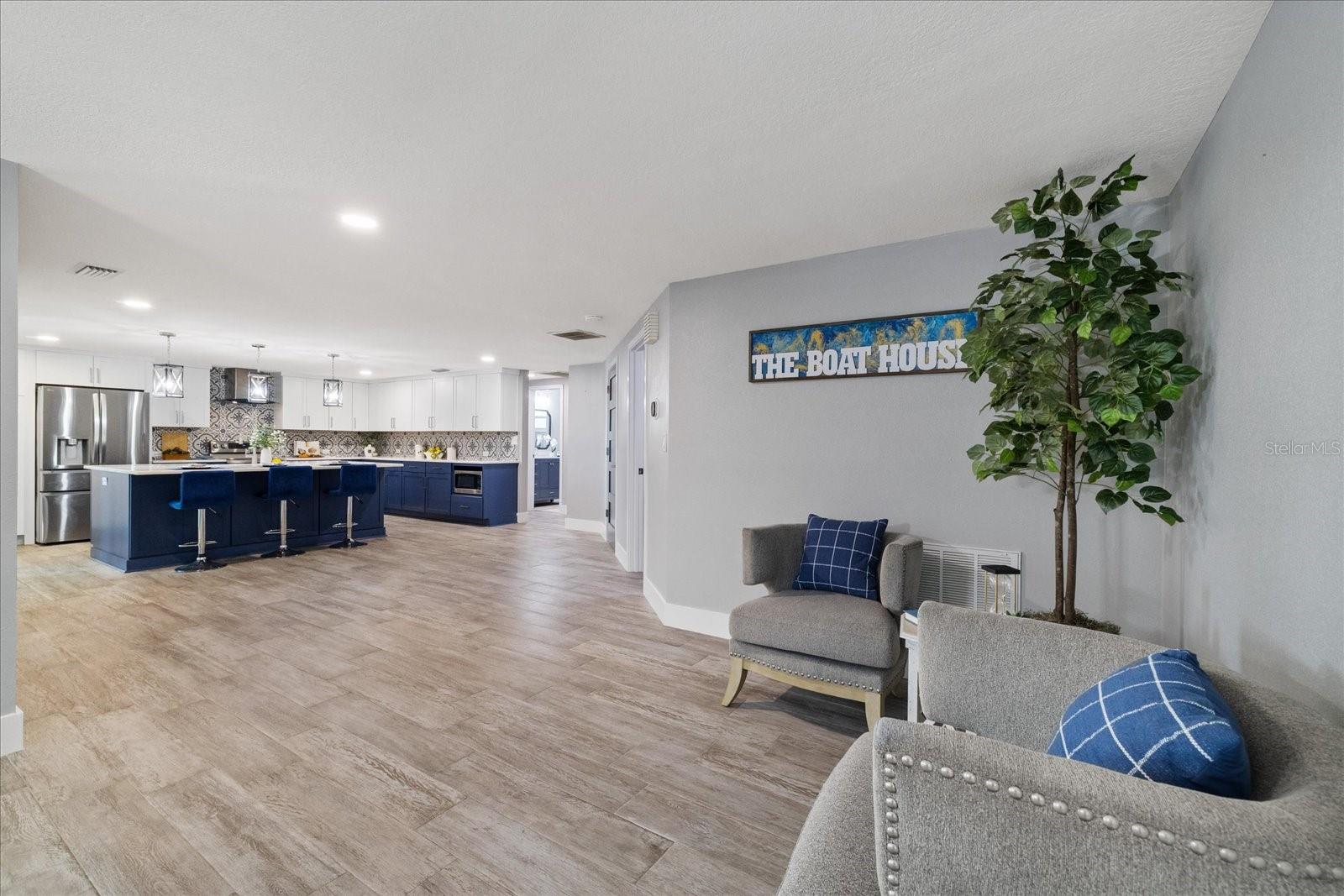 Sitting area near dining and kitchen spaces