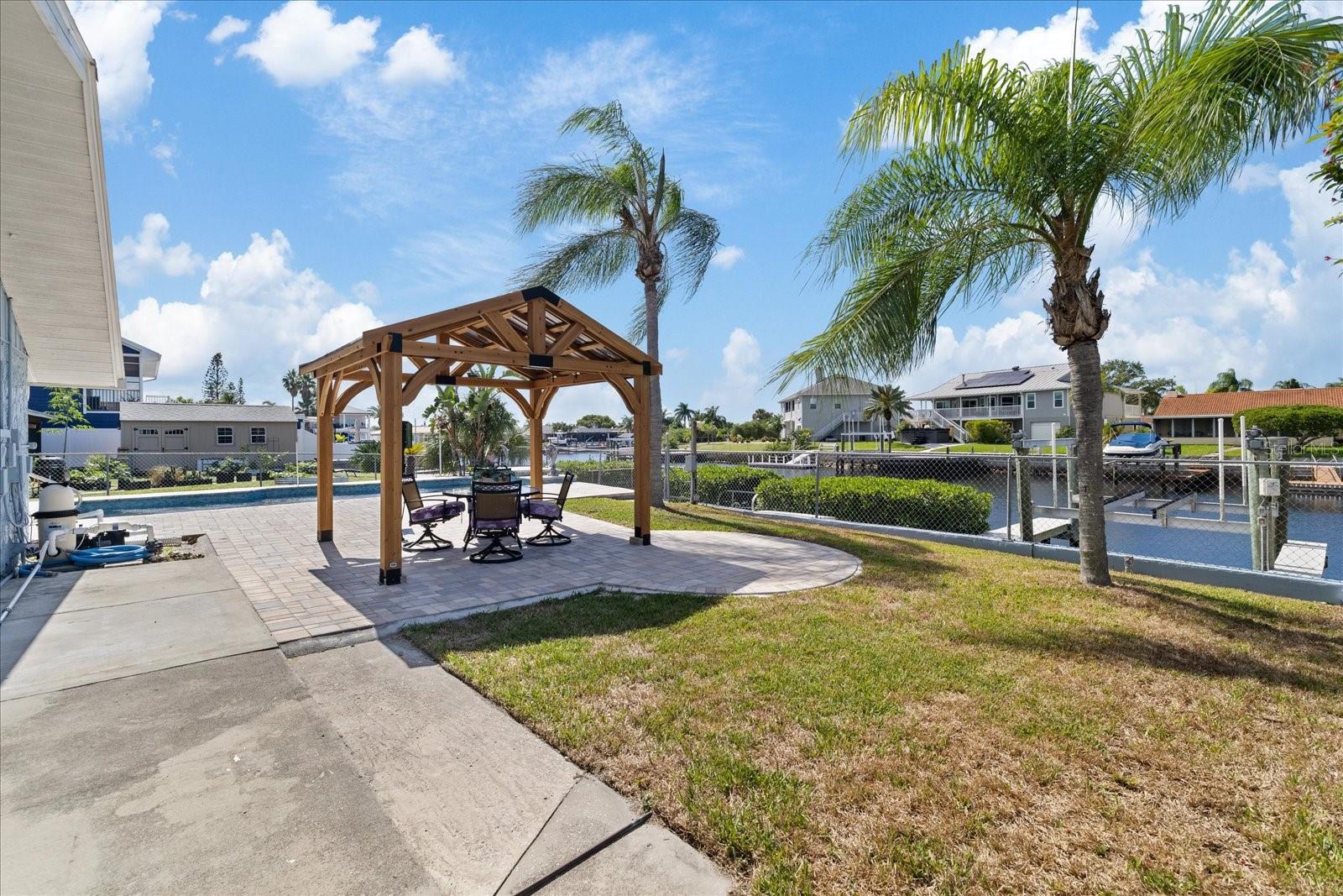 Backyard view to wide canal