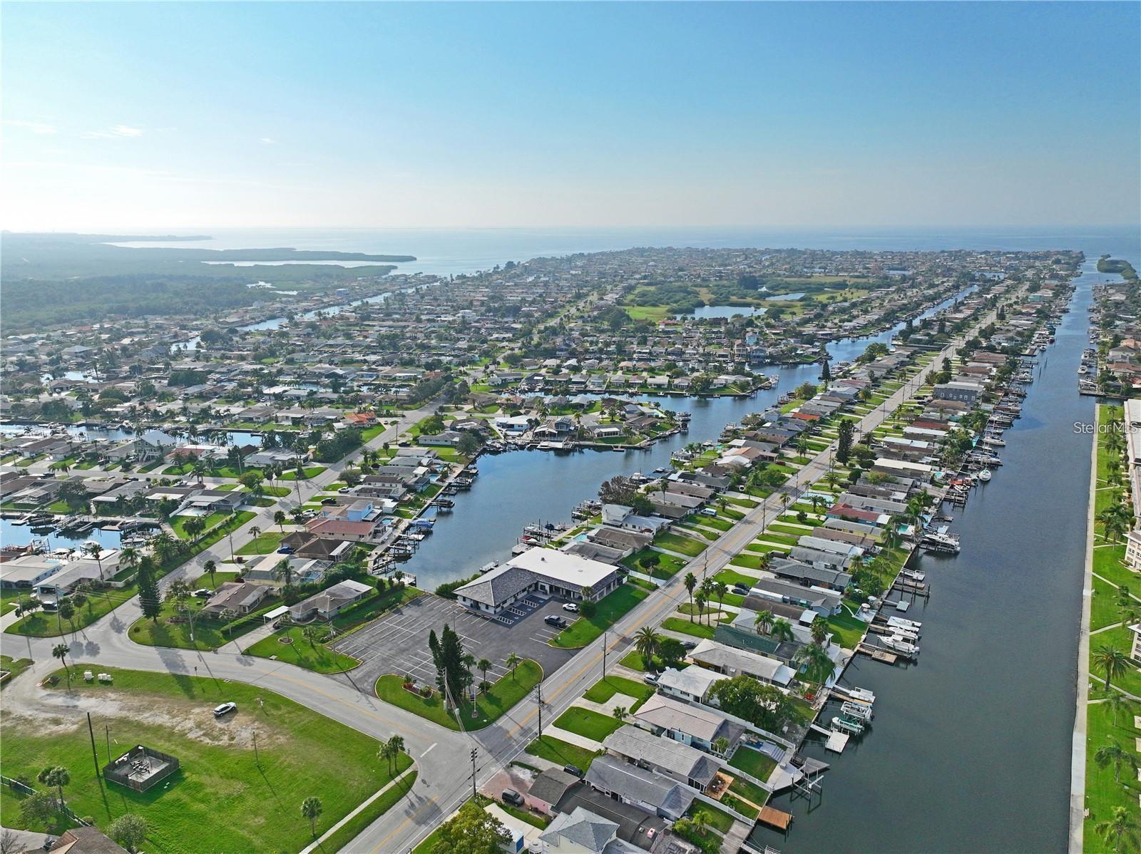 Aerial of Gulf Harbors north channel and inner channel behind civic center