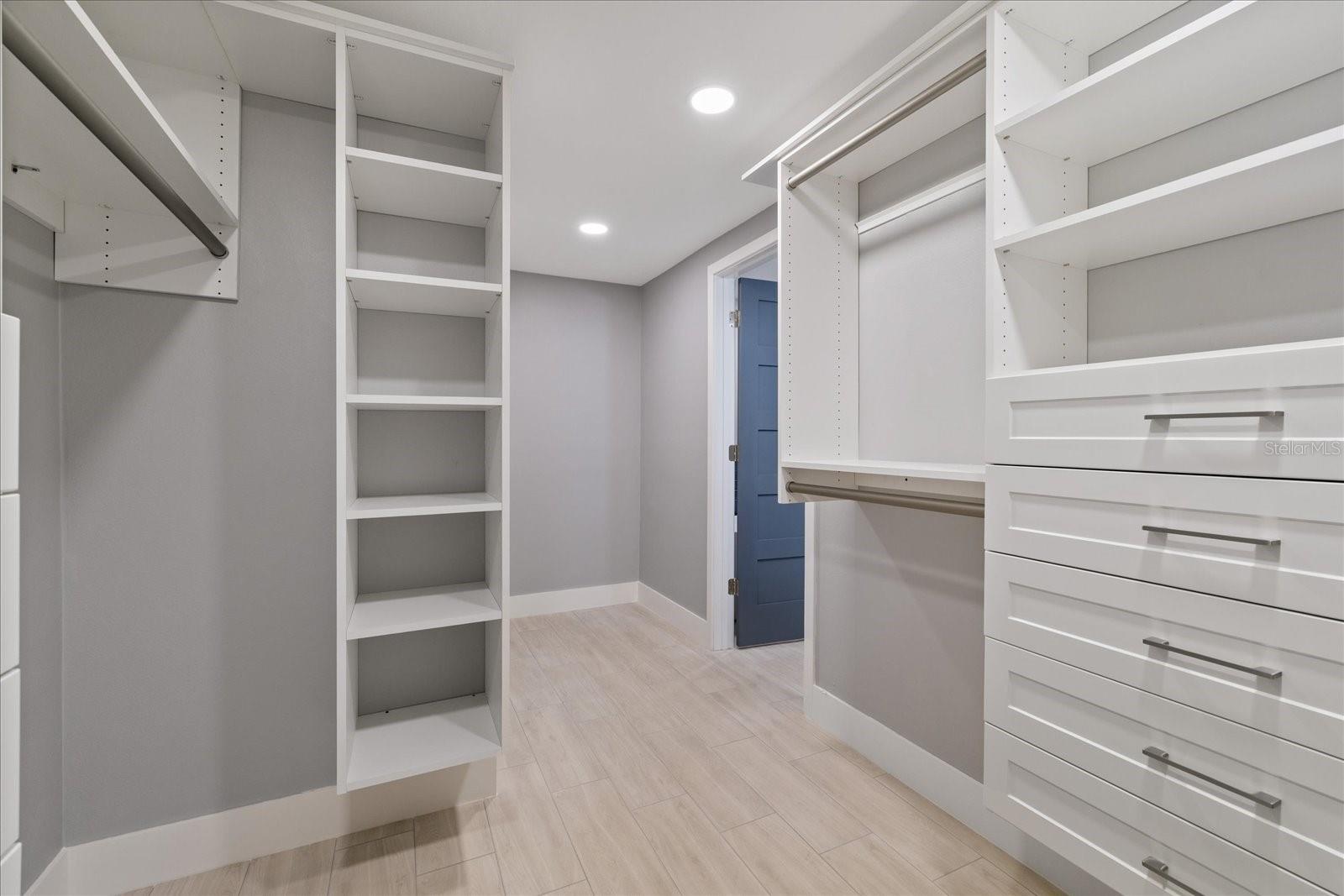 Looking toward doorway inside primary walk in closet