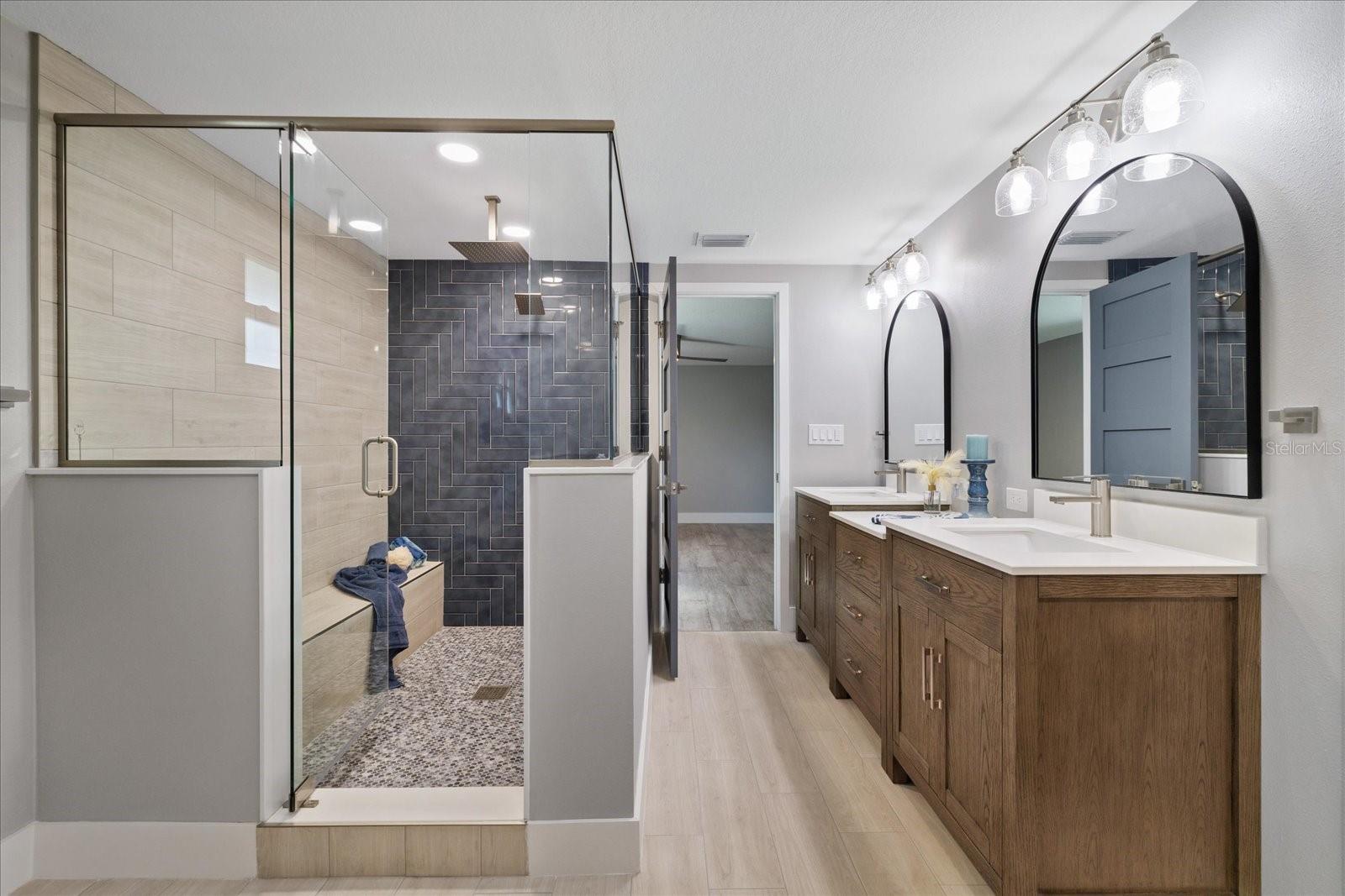 Large walk-in shower with ledge in primary Large walk-in shower with ledge in primary