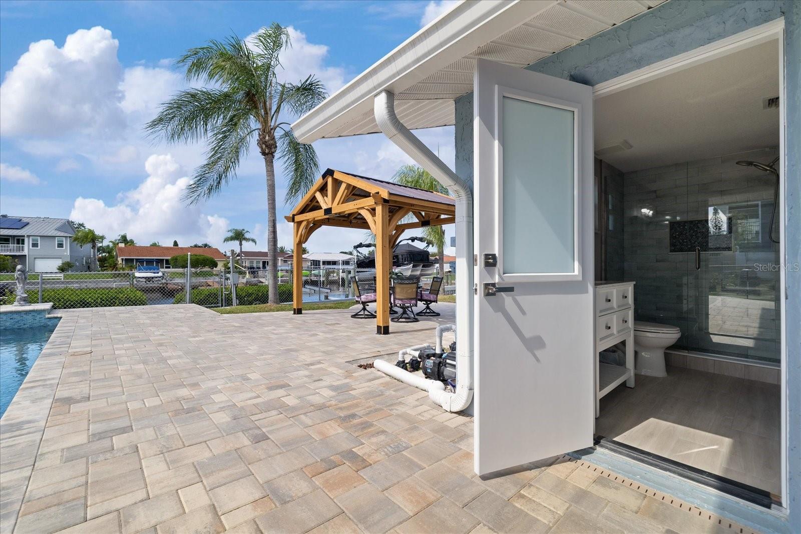 Entrance to full pool bath with shower