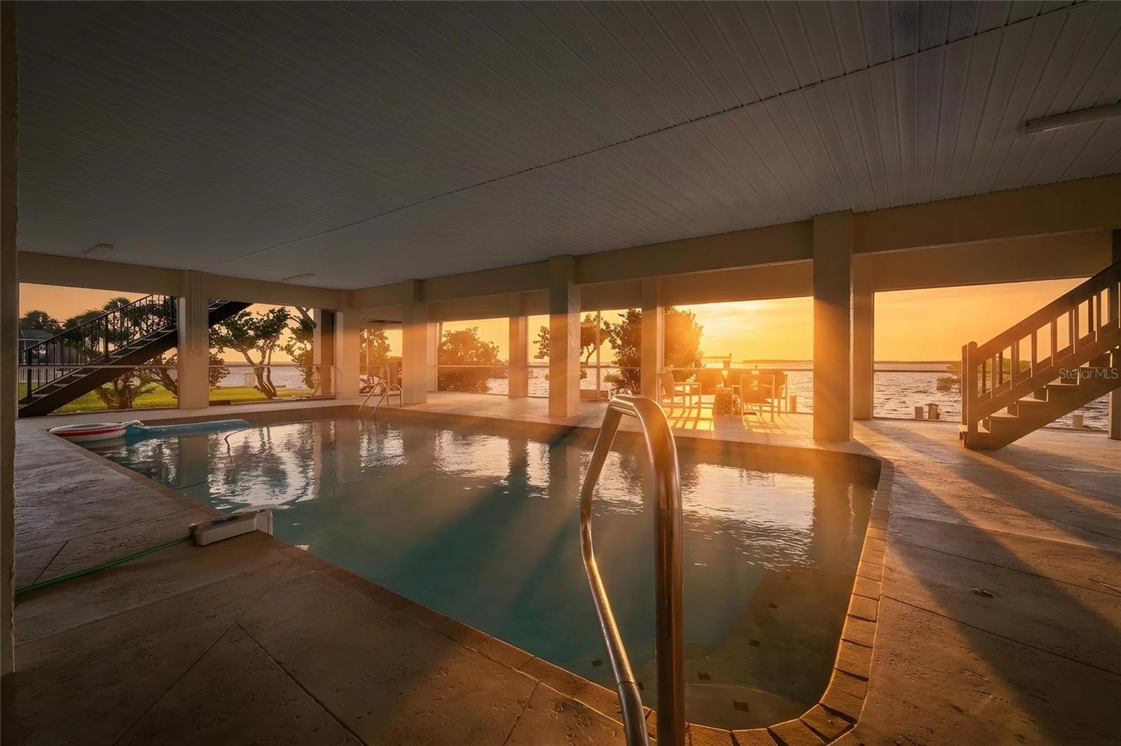 Virtually Edited, covered pool at sunset