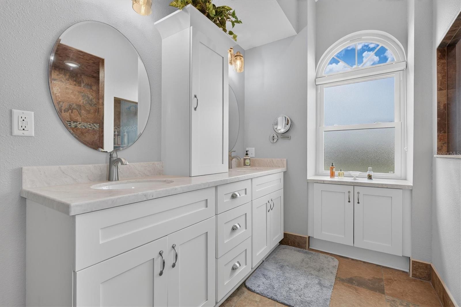 Primary Bathroom with Dual Sinks & Tower