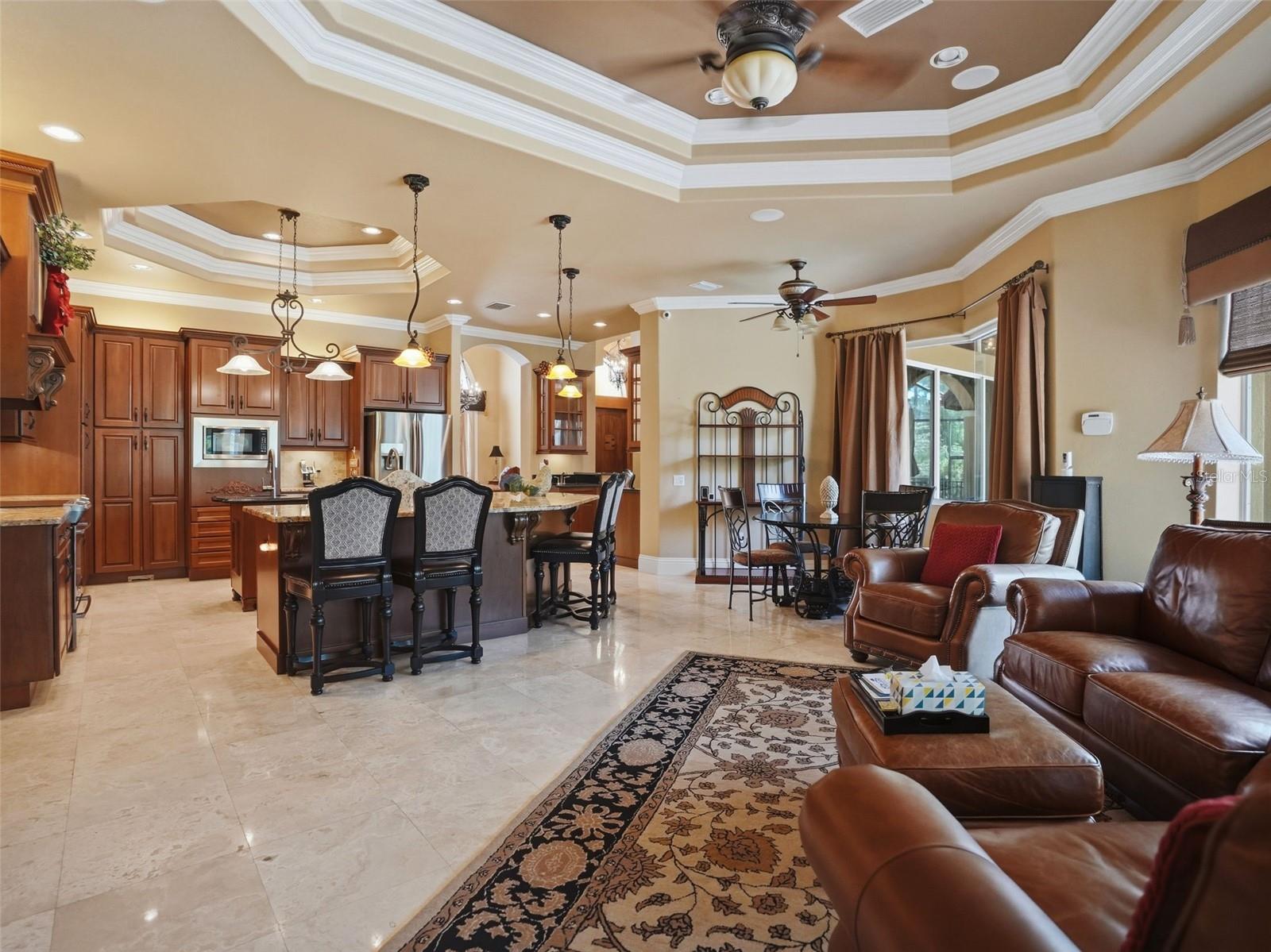 The kitchen is open to the large gathering family room