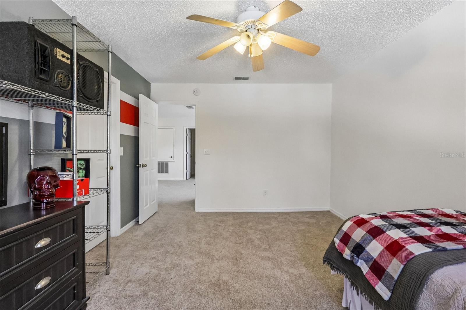 2 of 4 total bedrooms upstairs -- one at each corner of the house. This one has a LARGE WIC.