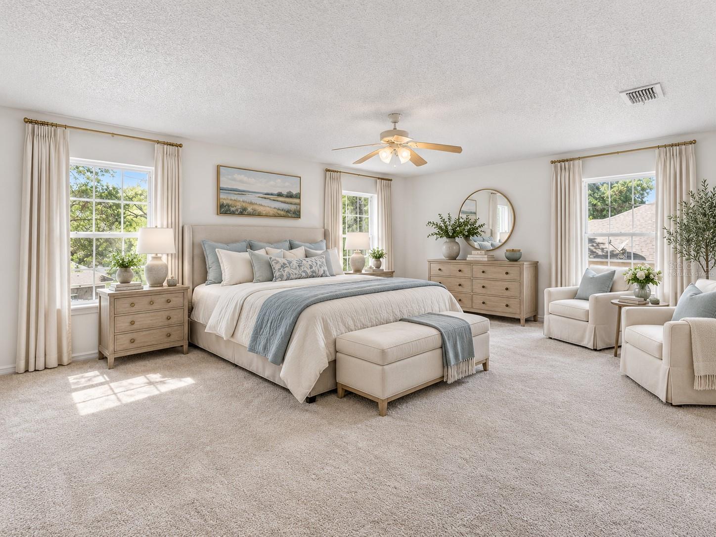 Large master bedroom with en-suite bath and two walk-in closets. Virtually staged in the Nancy Meyers style here for the full effect!