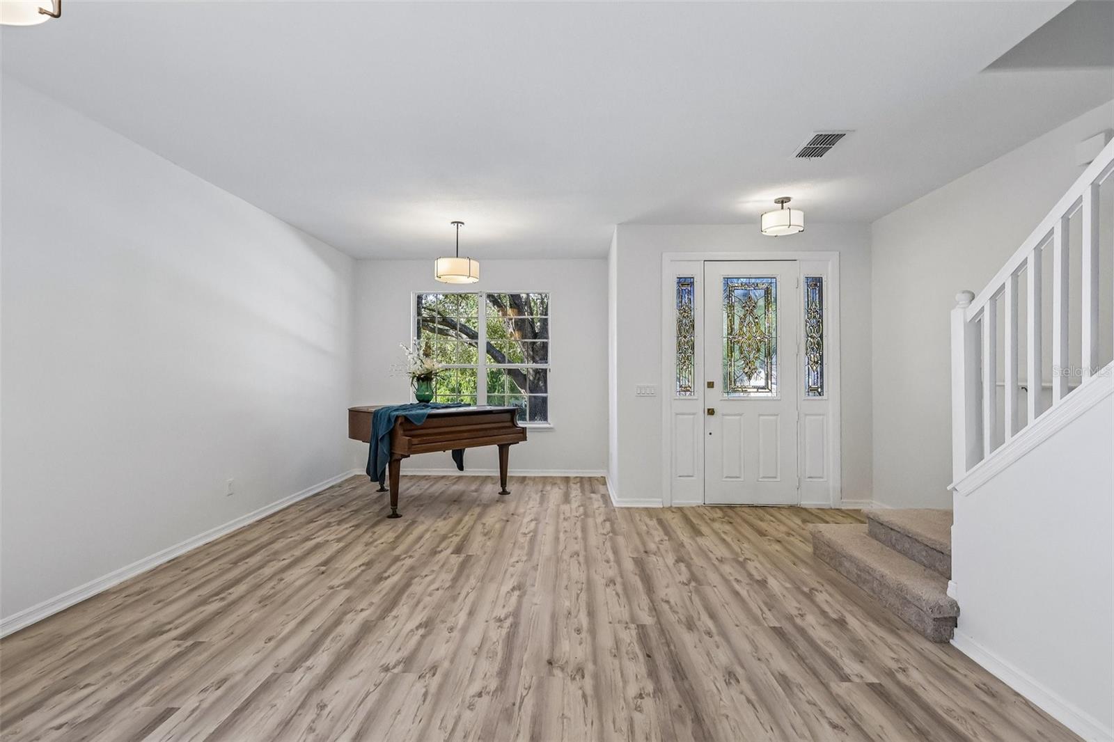 Large enough for a baby grand piano. Elegant!