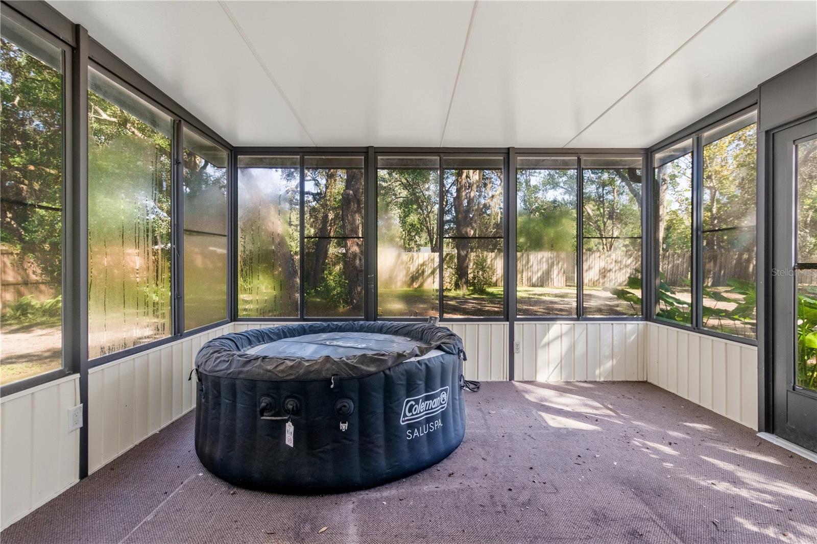 Porch and spa off of Primary Bedroom