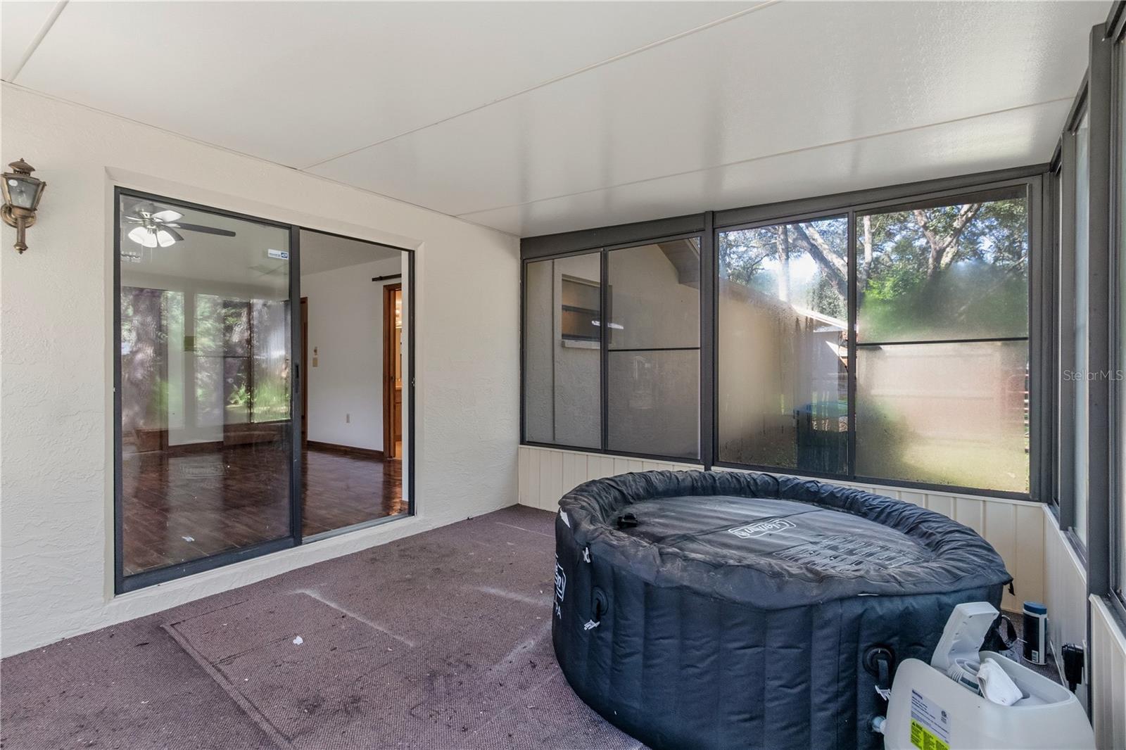 Porch and spa off of Primary Bedroom