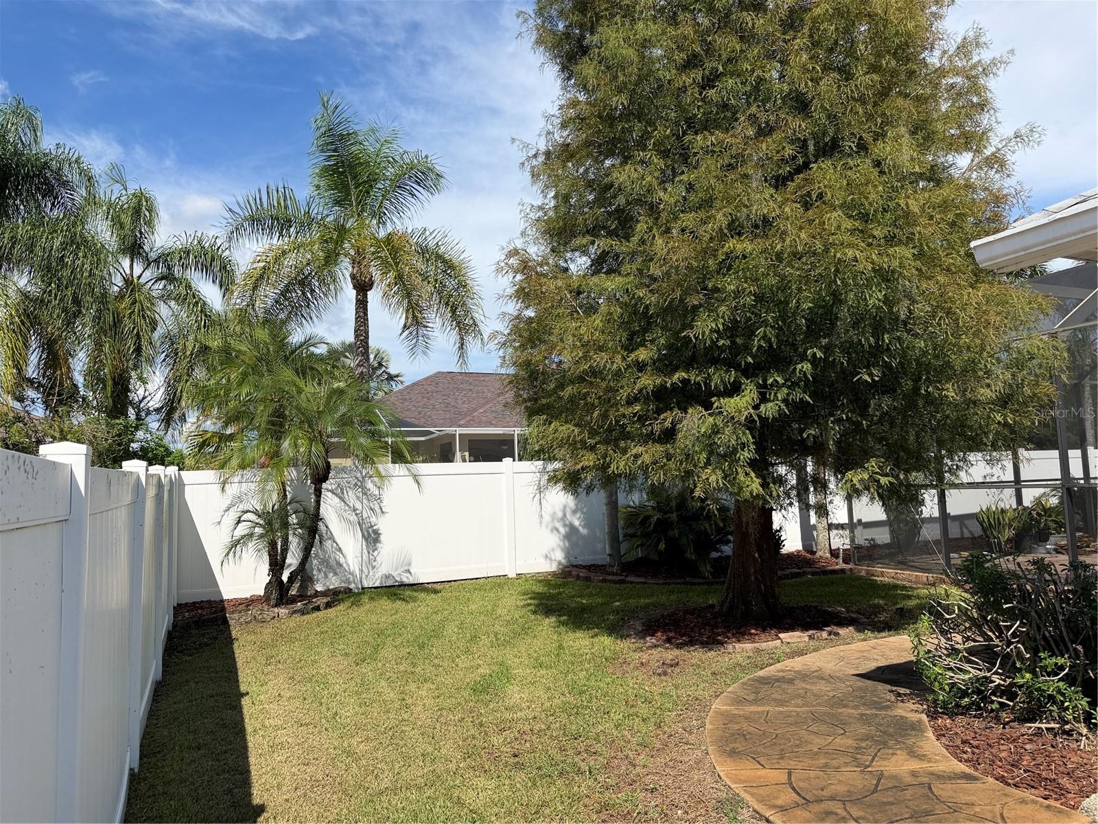 Beyond the privacy fence is access to the common area, clubhouse and community pool