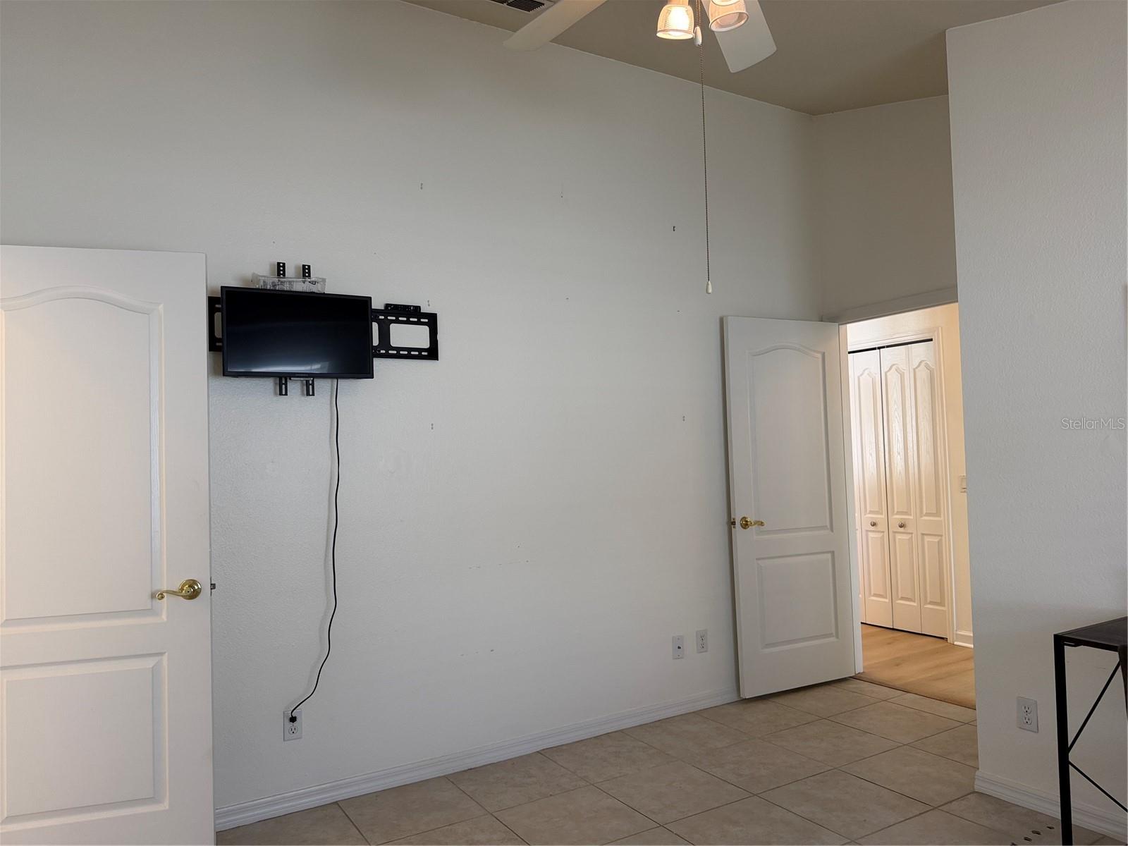 Bracket mounted to wall for flat screen TV