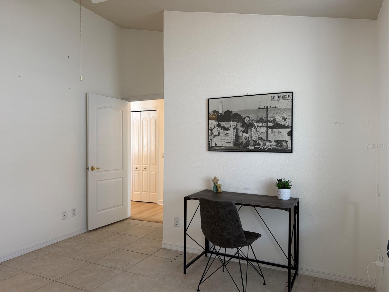Cathedral ceiling, Door leads to garage, bonus room, laundry, and kitchen