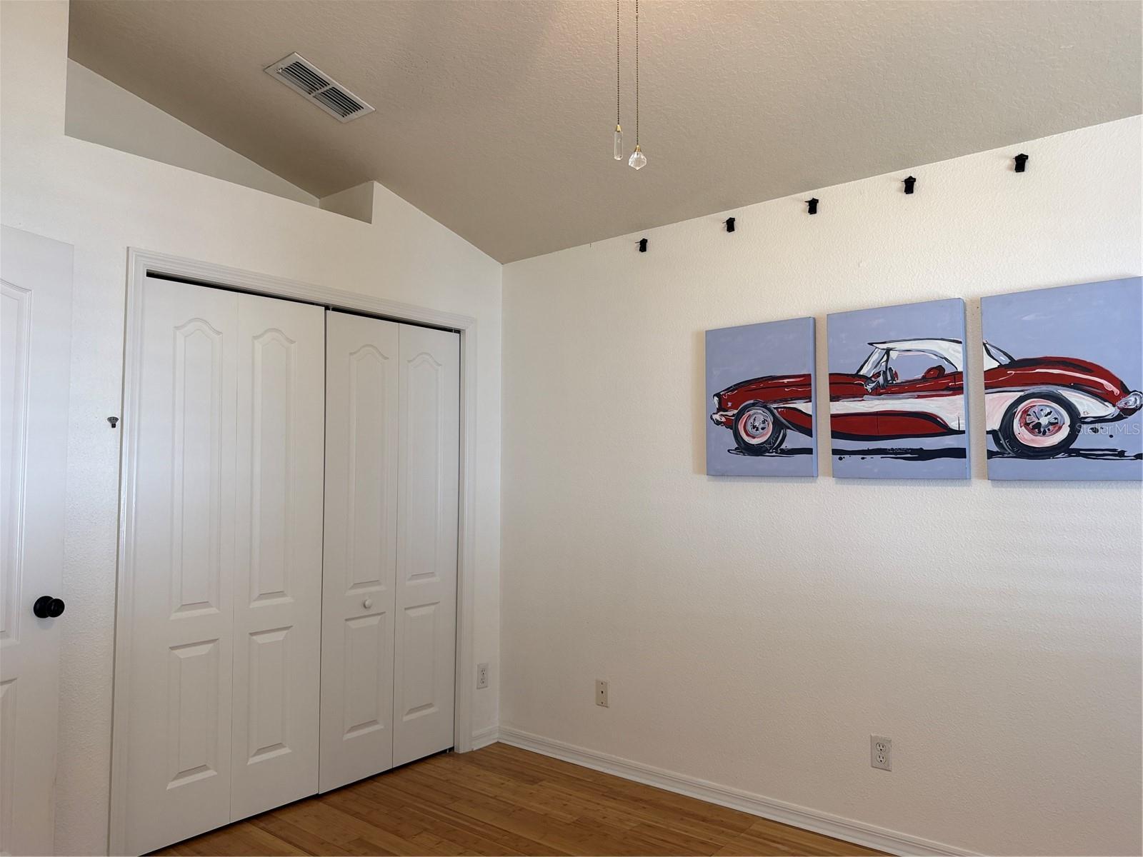 Closet and decorative alcove above closet for decorations