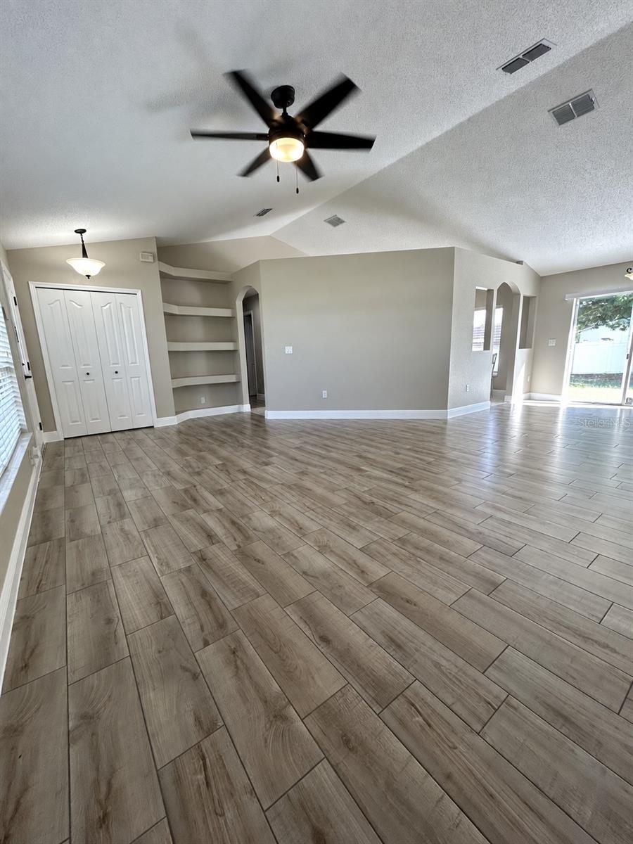 Living area with built-in shelves