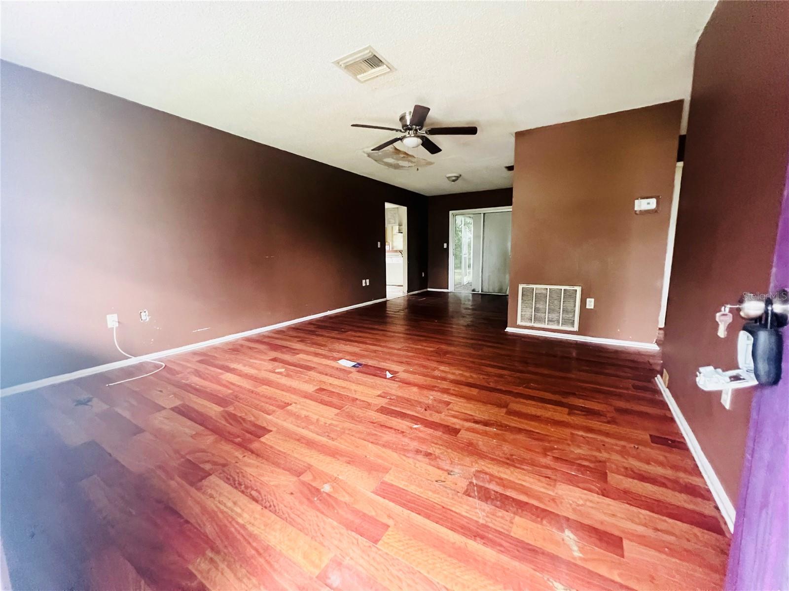 LIVING AND DINING AREA VIEW FROM FRONT DOOR