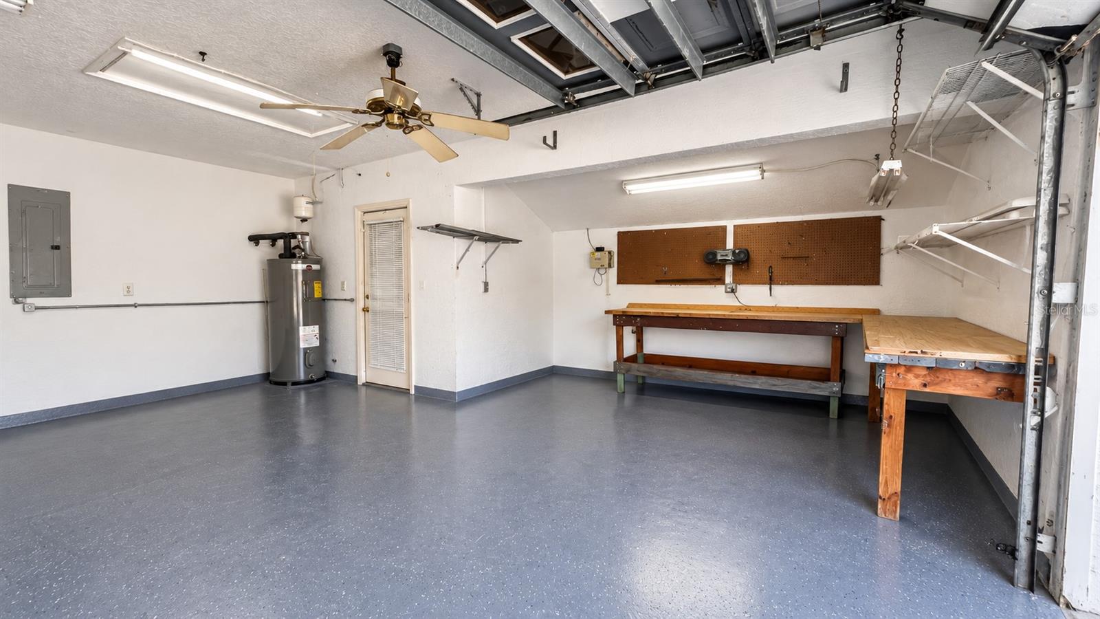 Virtually emptied garage so you can see the 8 x 12 shop area in the garage.