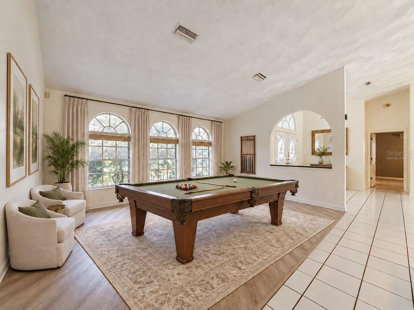 . . . use it as a games room! (Also virtually staged.)