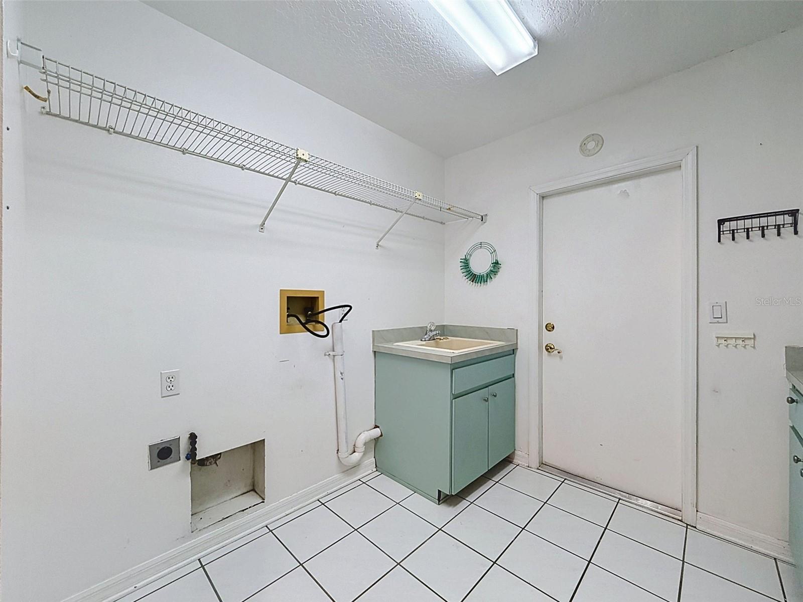 Laundry room has storage gallore!