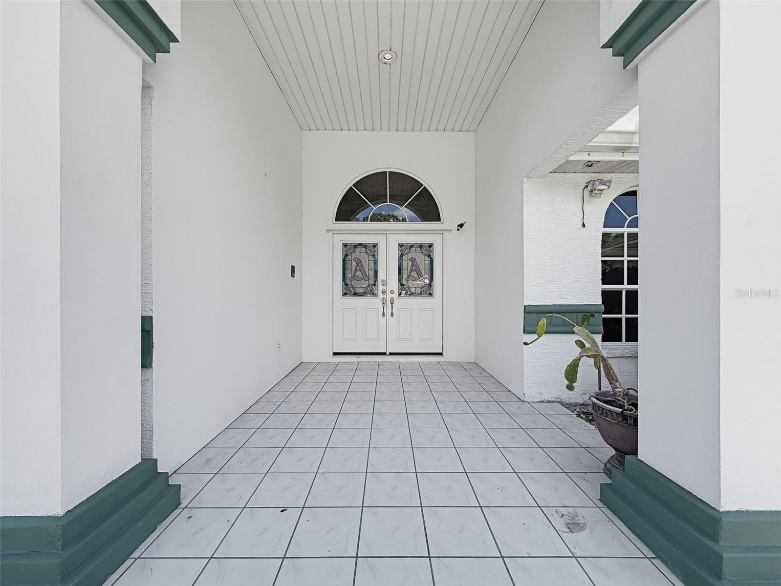 Large front patio to greet guests.