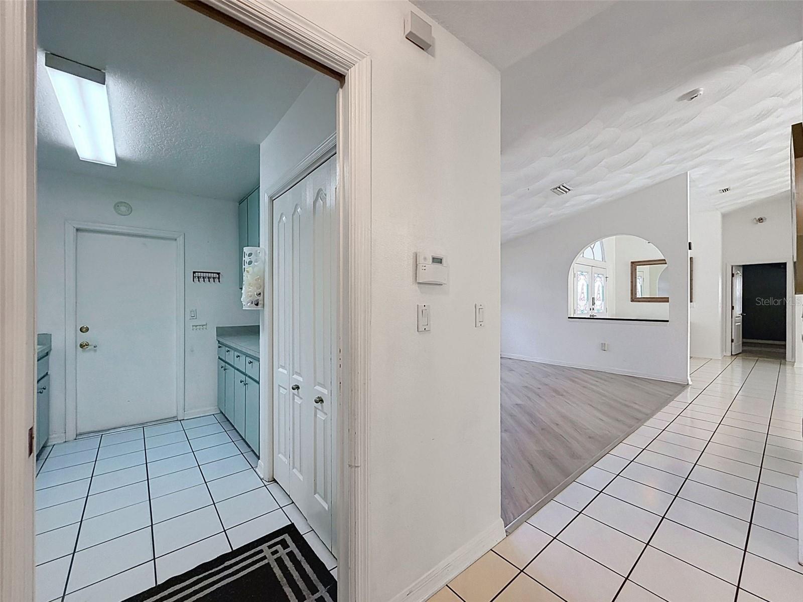 View to laundry room and dining room.