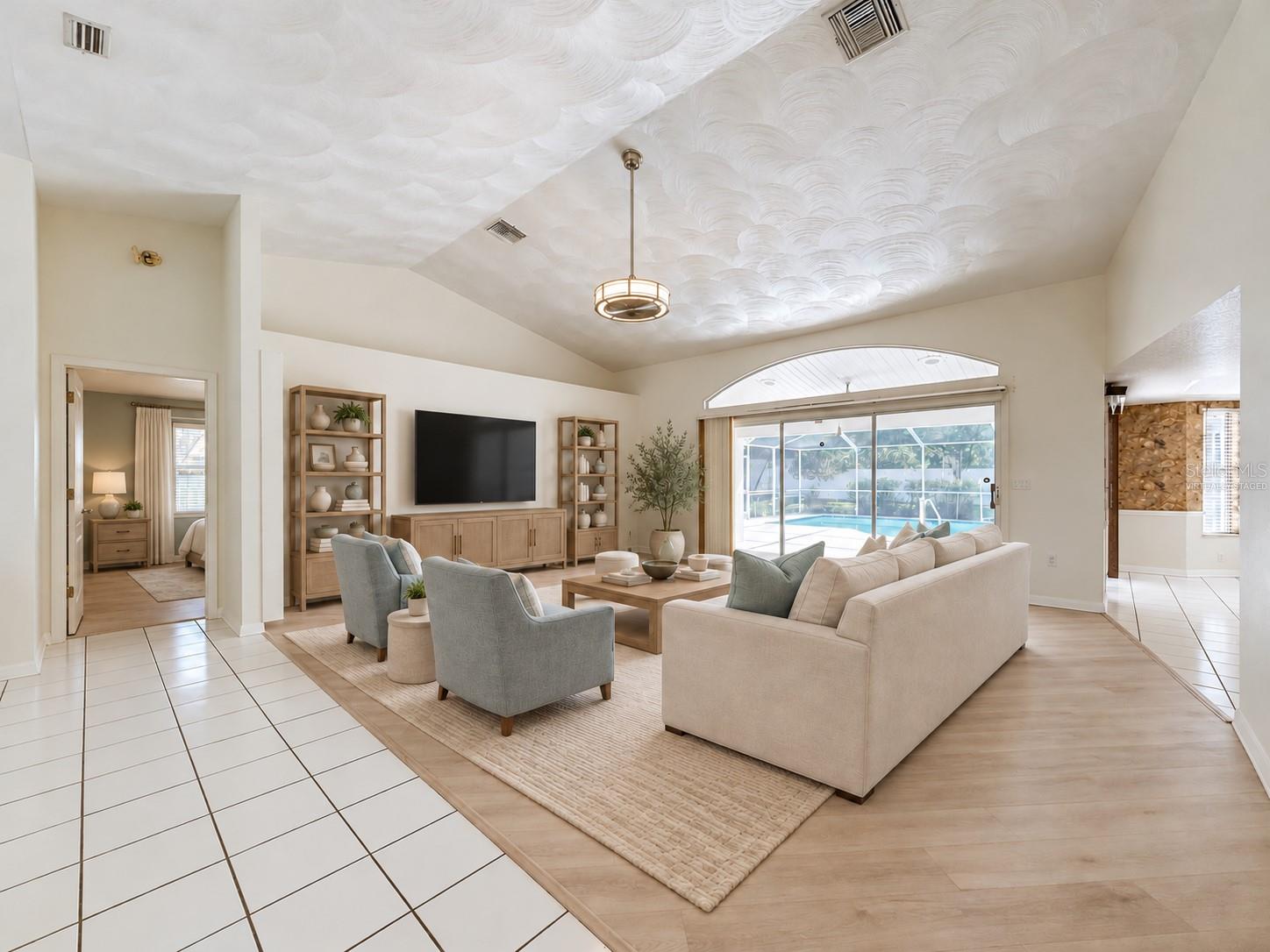 Welcome home to this HUGE great room with relaxing view. (virtually staged)