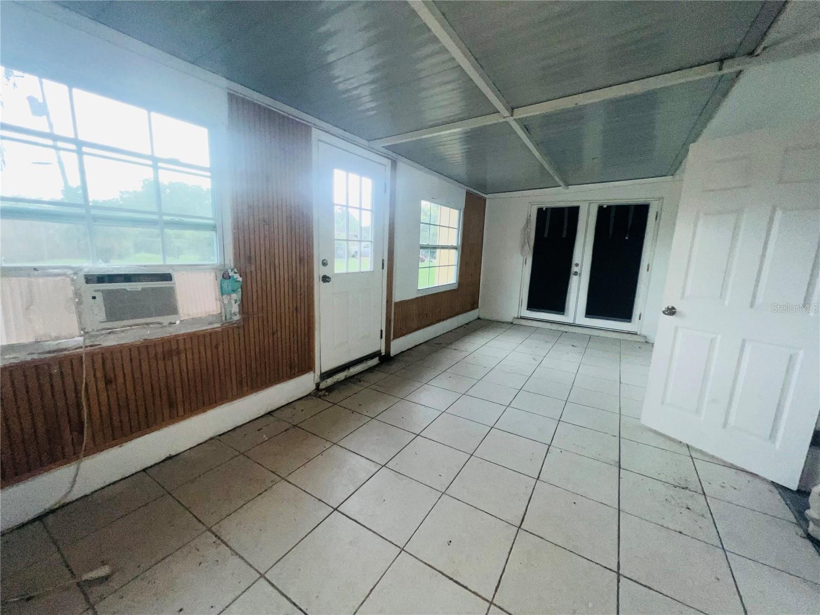 FLORIDA ROOM OR CRAFT ROOM WORKOUT ROOM