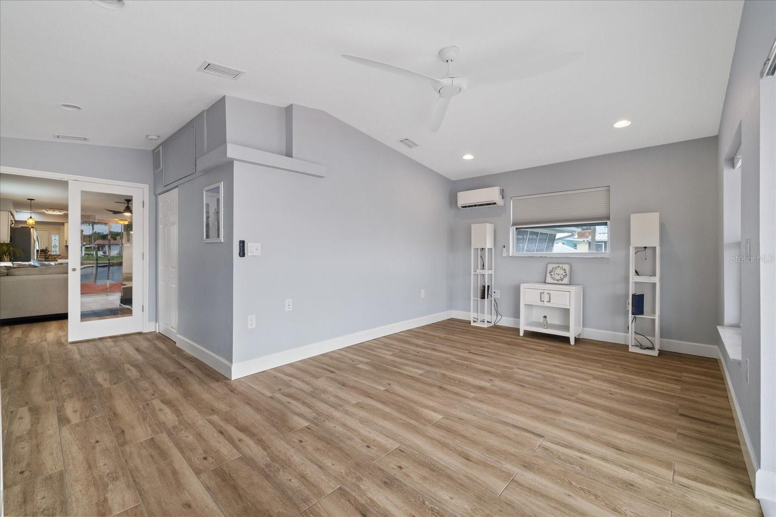 Back bedroom or office/sitting room with french doors