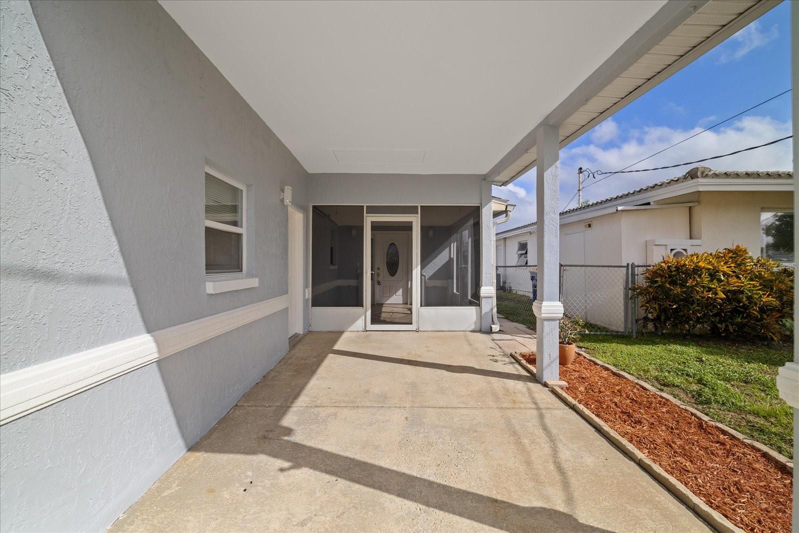 Carport next to garage
