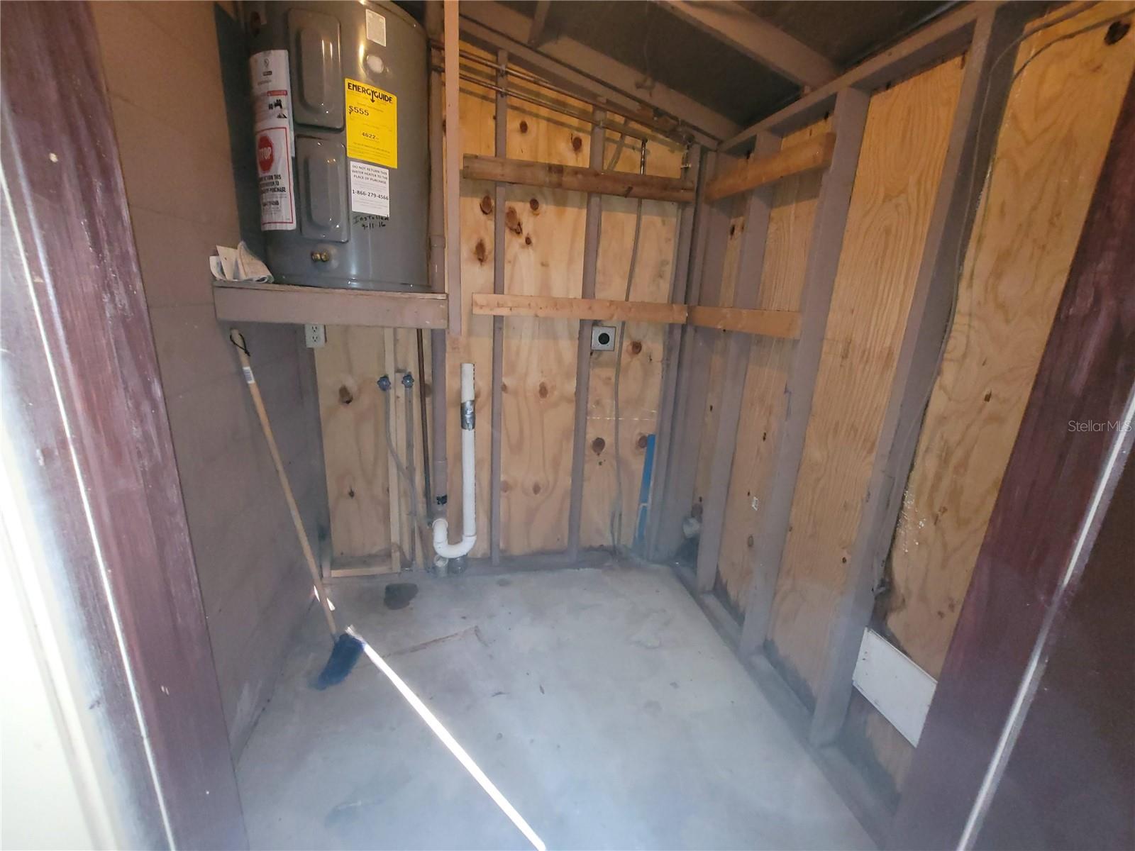 Laundry closet with washer/dryer hook-ups in off of the back patio
