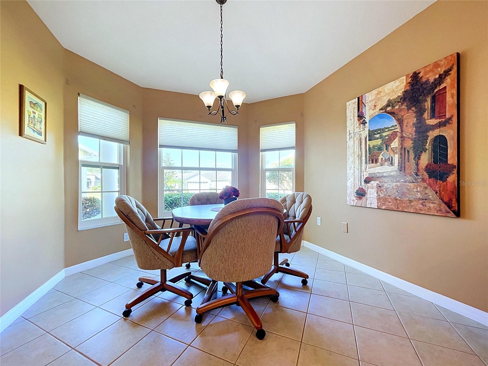 Eating in the kitchen overlooks the neighborhhood