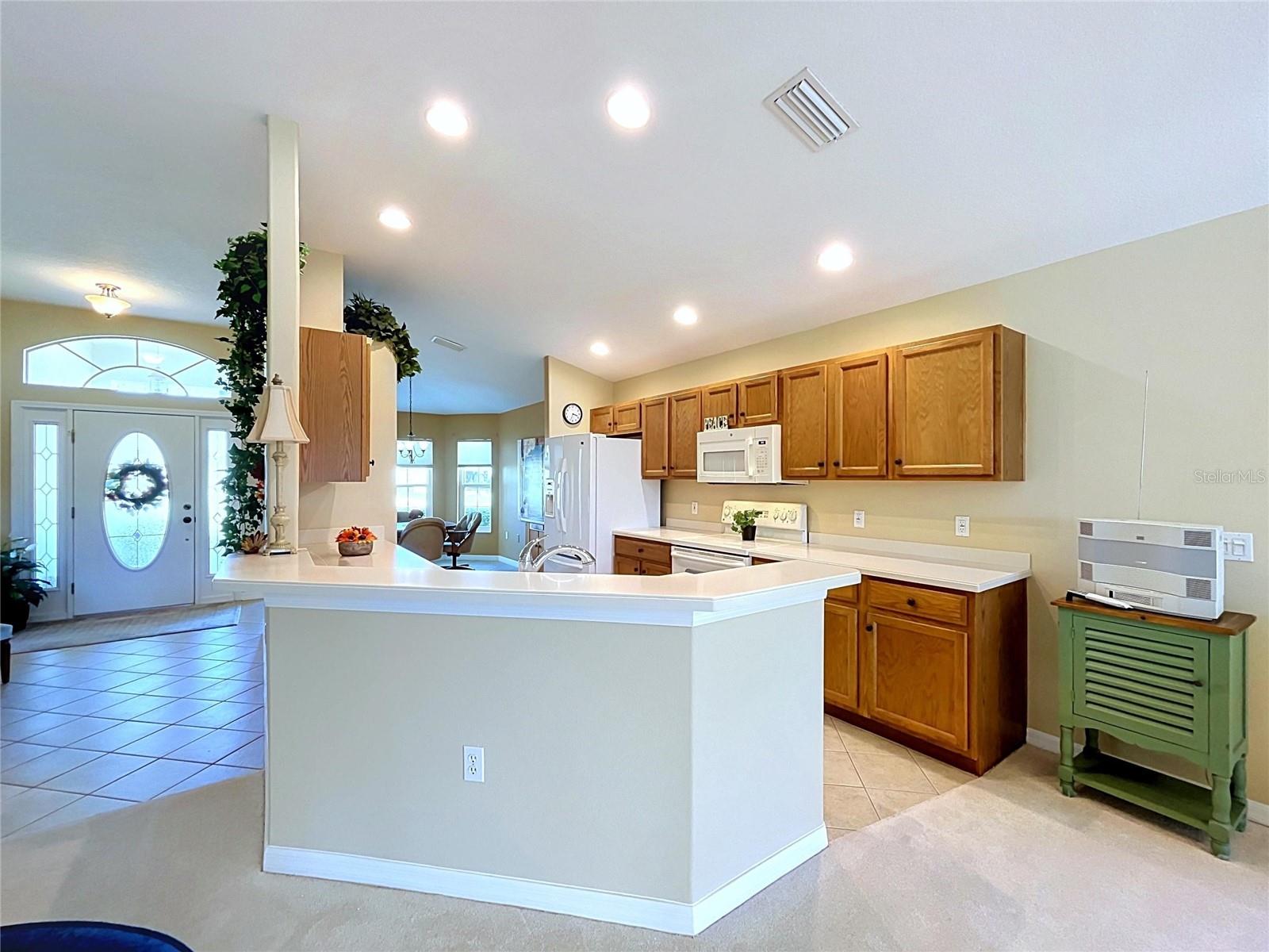 Kitchen is in the center of the home
