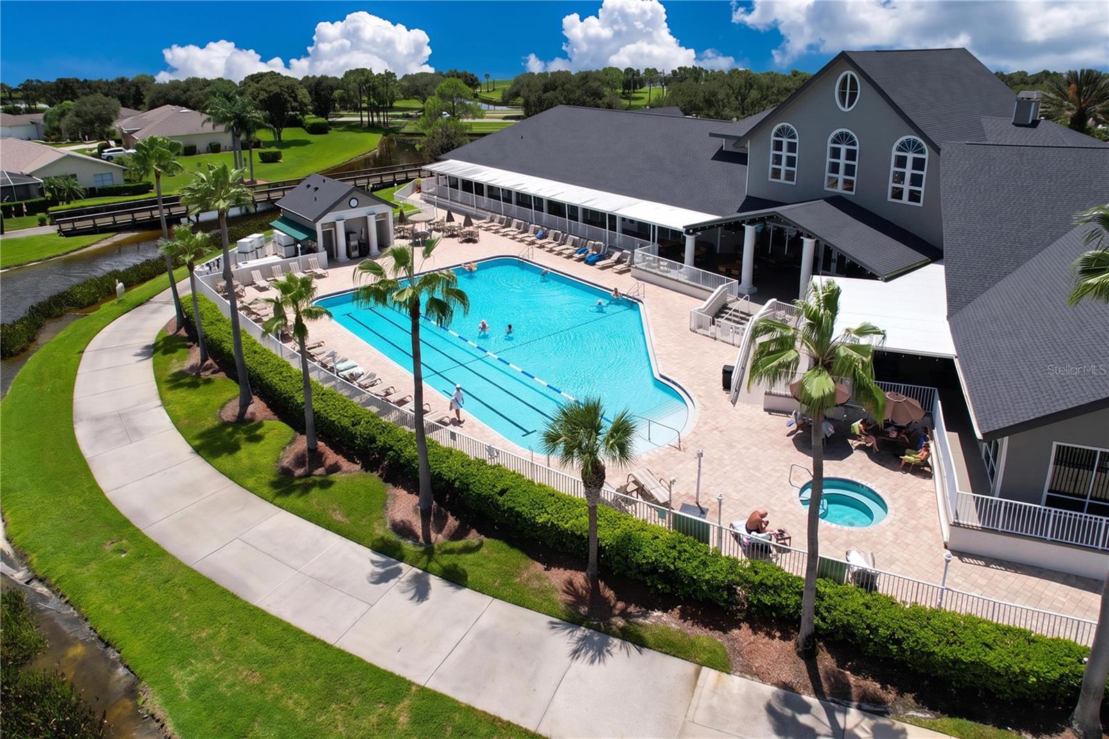 Deck overlooks pool and spa