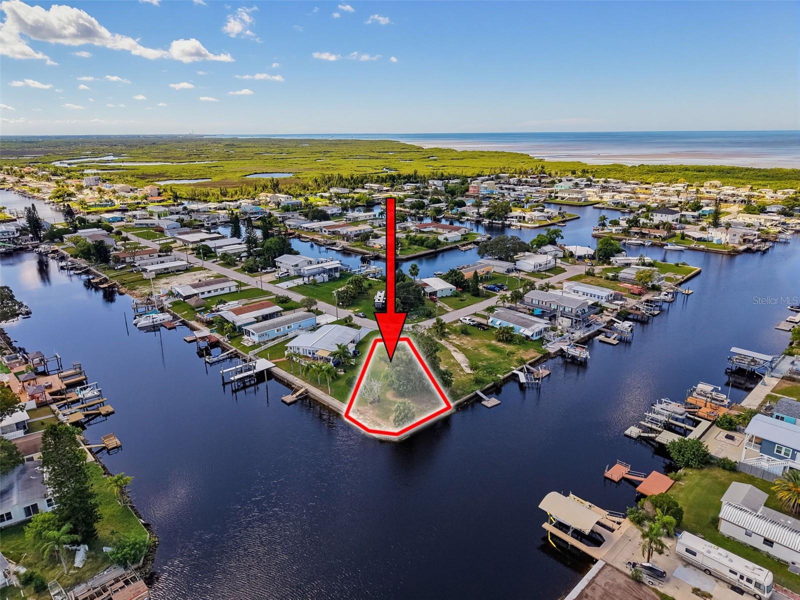 LOCATION, LOCATION, LOCATION! An exceptional waterfront opportunity in Signal Cove!