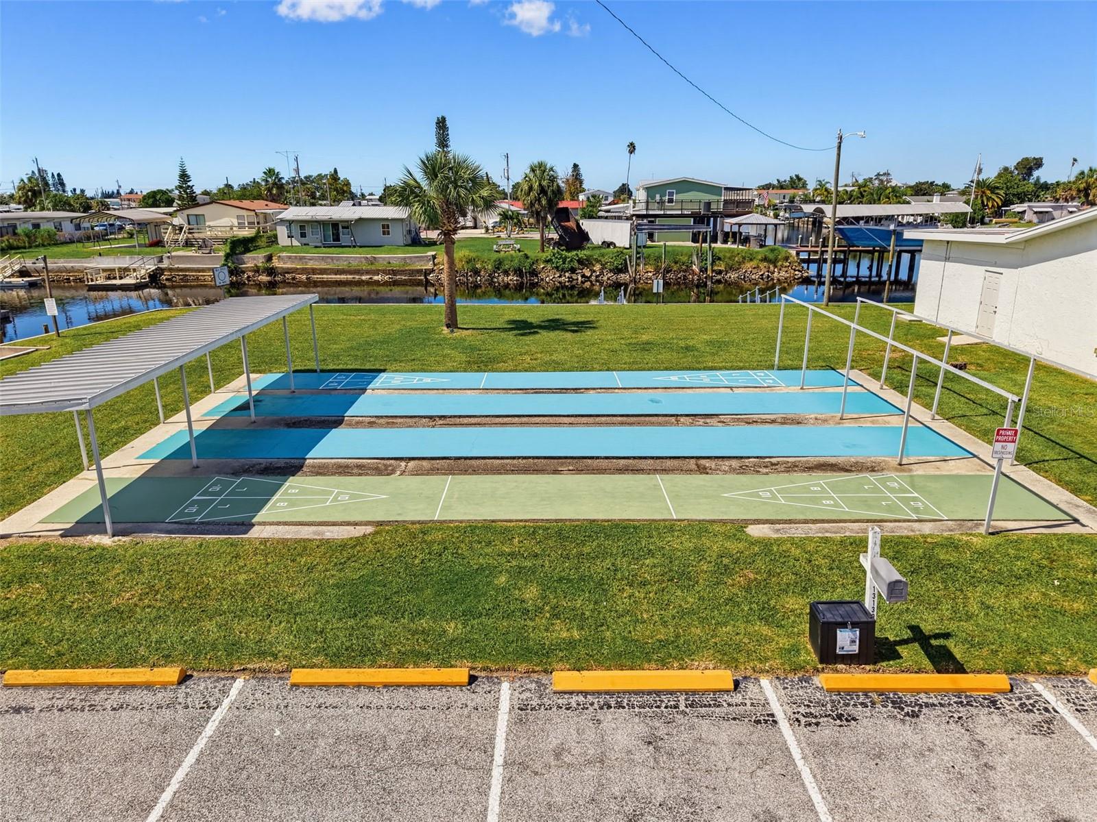 FUN BEYOND THE WATER! Enjoy shuffleboard and community recreational amenities!