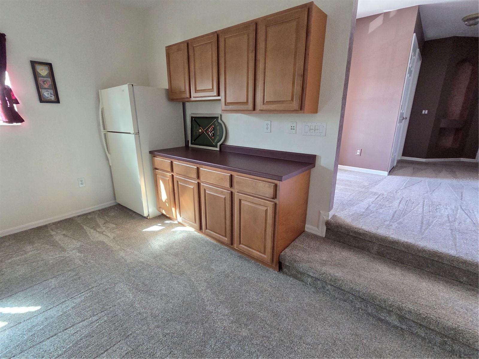 Mini kitchen area, plumbeb for future sink