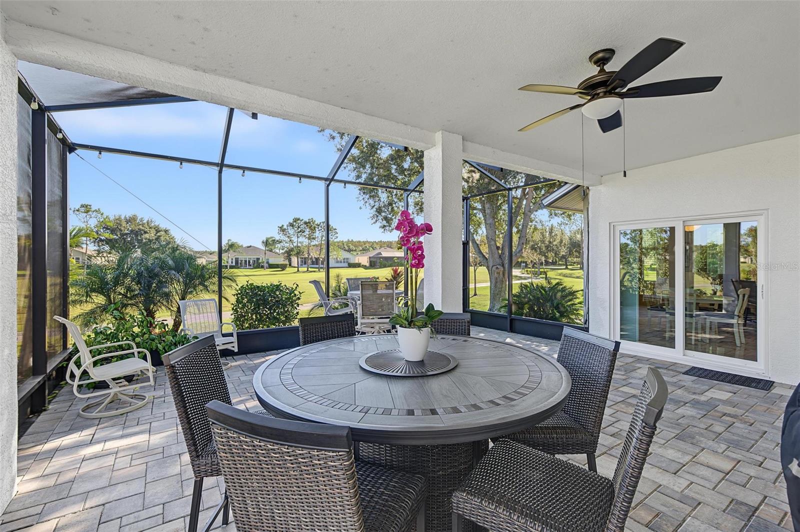 Screened in lanai offers a wonderful place to start or end your day