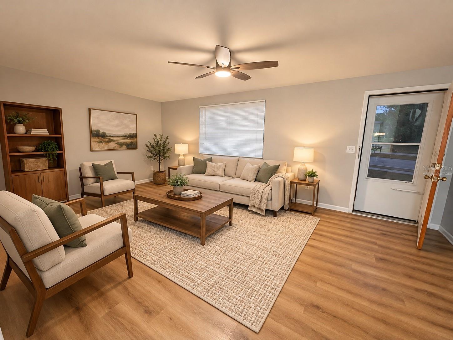 Virtually Staged View of Living Room and Dining