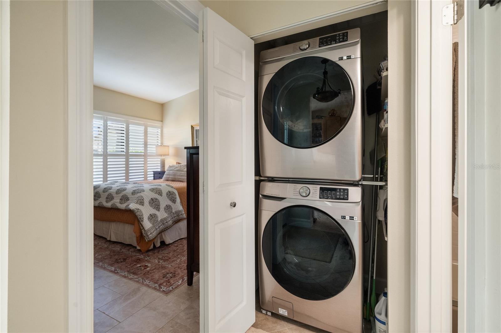 INSIDE LAUNDRY CLOSET IN HALL