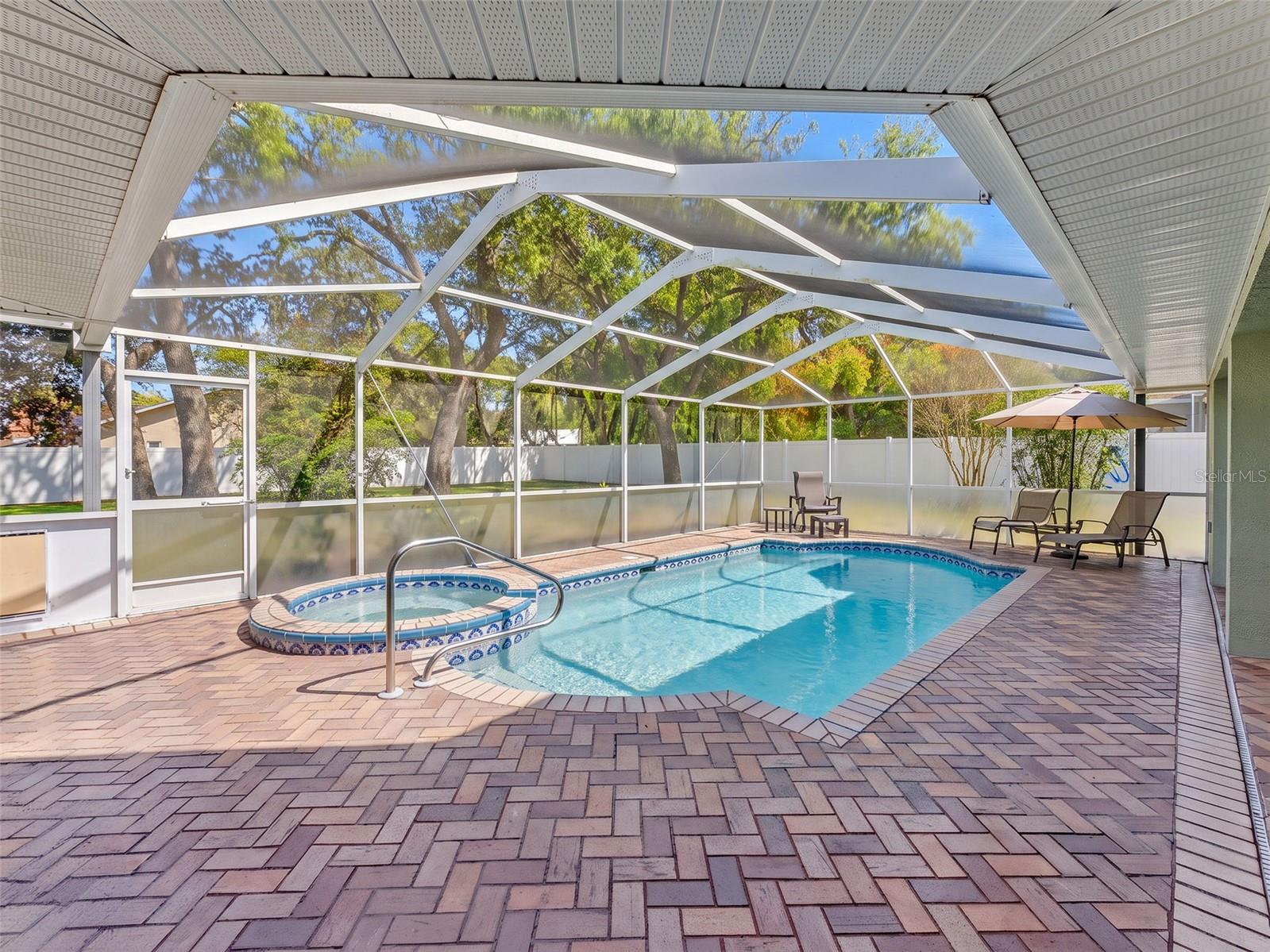 Well maintained pool and deck area.