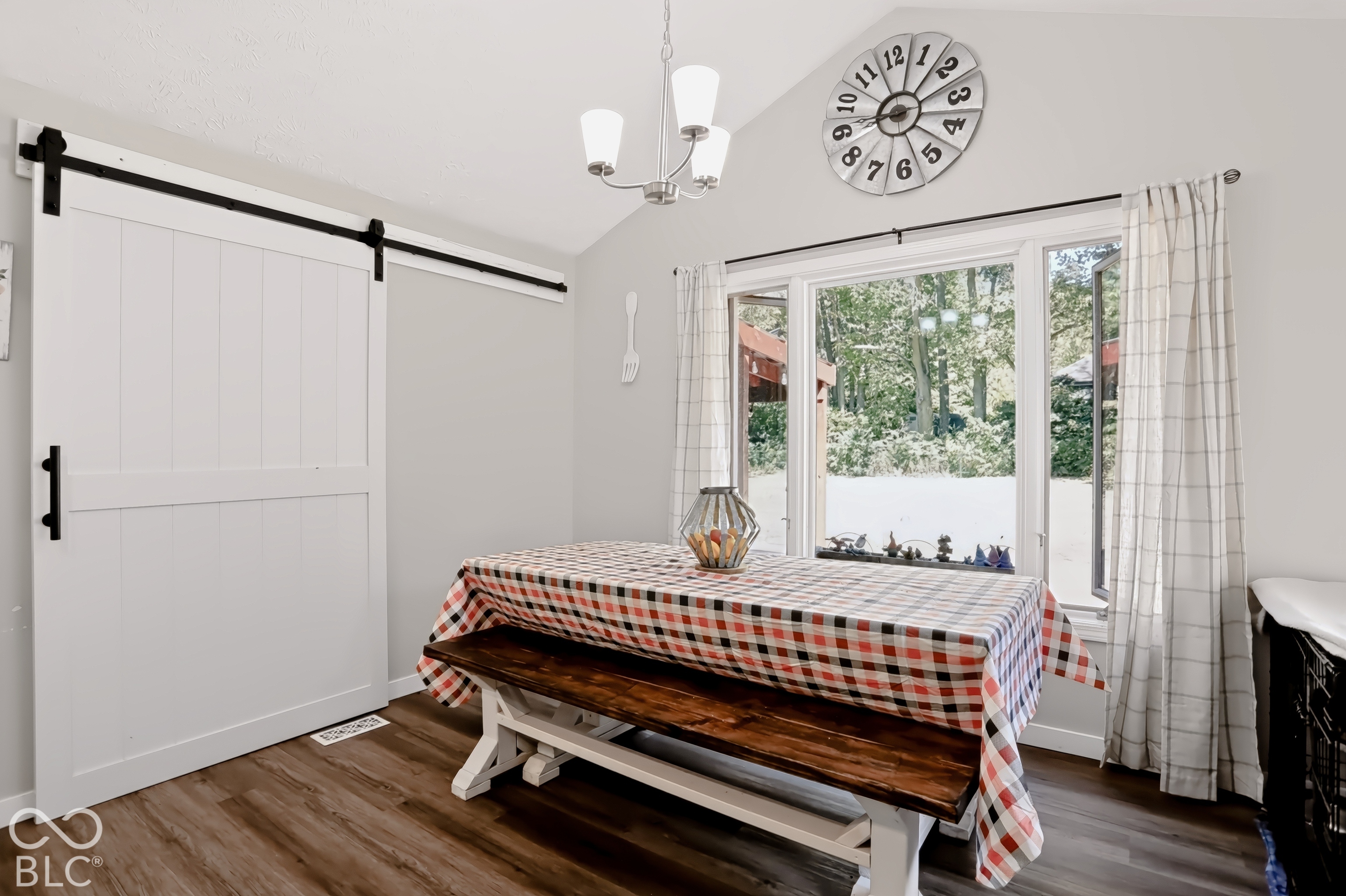 Vaulted ceiling with an attached chandelier